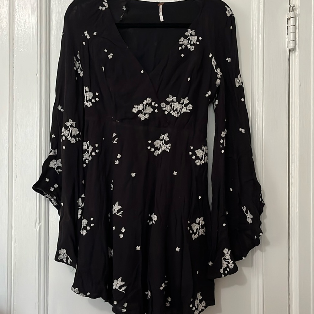 Free people mini black dress with flowers. Bell sleeves